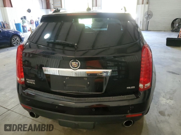 2016 Cadillac SRX Premium Collection с VIN 3GYFNDE35GS505972, выставлен на аукционе Copart как лот 79342004 с пробегом 166 238 миль миль и Чистый • Clean title. История ставок и продаж доступна на DreamBid. Изображение 6.
