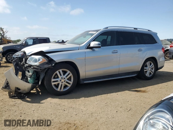 2014 Mercedes-Benz GL 450 z VIN 4JGDF7CE1EA354378, wystawiony jako Copart lot #59889305 z przebiegiem 79 821 mil mil oraz Szkoda całkowita • Salvage title. Historia ofert i sprzedaży dostępna na DreamBid. Obrazek 1.