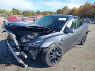 2020 Tesla Model Y Long Range with VIN 5YJYGDEE0LF041762, listed as a IAAI auction lot 40556913 with Not Provided miles and . Bid and sale history available at DreamBid. Image 2.