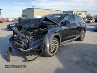 2019 Lincoln Nautilus Reserve z VIN 2LMPJ6L97KBL11497, wystawiony jako Copart lot #87582445 z przebiegiem Nie podano mil oraz Szkoda całkowita • Salvage title. Historia ofert i sprzedaży dostępna na DreamBid. Obrazek 1.