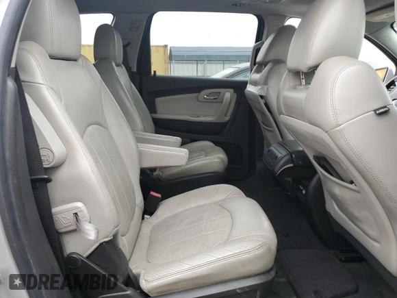 2012 Chevrolet Traverse LTZ z VIN 1GNKRLED8CJ262091, wystawiony jako Copart lot #55527805 z przebiegiem Nie podano mil oraz Szkoda całkowita • Salvage title. Historia ofert i sprzedaży dostępna na DreamBid. Obrazek 11.