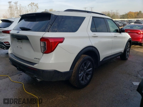 2022 Ford Explorer XLT with VIN 1FMSK8DH9NGC15548, listed as a Copart auction lot 77819694 with 23,087 mi miles and Salvage Title. Bid and sale history available at DreamBid. Image 3.