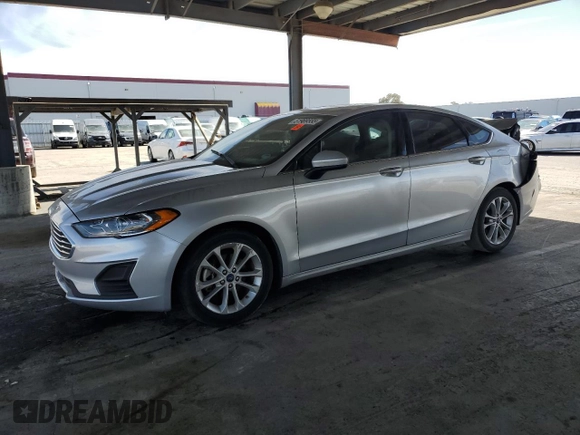 2019 Ford Fusion Hybrid SE with VIN 3FA6P0LU7KR262160, listed as a Copart auction lot 51969555 with 99,699 mi miles and Salvage Title. Bid and sale history available at carsss.com. Image 1.