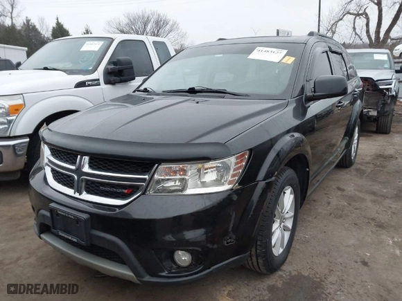2013 Dodge Journey SXT with VIN 3C4PDCBB1DT565028, listed as a IAAI auction lot 41483127 with 129,997 mi miles. Bid and sale history available at carsss.com. Image 6.