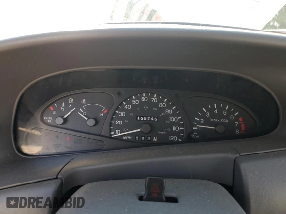1999 Ford Escort Cool with VIN 3FAKP1139XR219249, listed as a Copart auction lot 85089504 with 155,745 mi miles and Salvage title. Bid and sale history available at DreamBid. Image 9.
