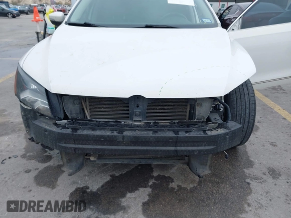 2014 Volkswagen Passat TDI SEL Premium with VIN 1VWCN7A32EC035738, listed as a IAAI auction lot 41641843 with 151,159 mi miles. Bid and sale history available at carsss.com. Image 6.