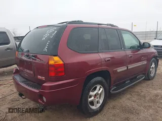2003 GMC Envoy SLT z VIN 1GKDS13S532314397, wystawiony jako IAAI lot #41184274 z przebiegiem 232 750 mil mil oraz . Historia ofert i sprzedaży dostępna na DreamBid. Obrazek 4.