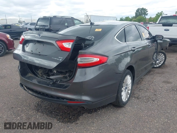 2016 Ford Fusion SE Hybrid with VIN 3FA6P0LU1GR191528, listed as a IAAI auction lot 42283058 with Not provided miles and . Bid and sale history available at DreamBid. Image 4.