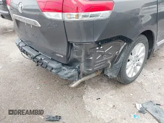 2011 Toyota Sienna XLE AAS with VIN 5TDYK3DC9BS158209, listed as a IAAI auction lot 42163526 with 107,385 mi miles and . Bid and sale history available at DreamBid. Image 12.