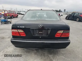 2002 Mercedes-Benz E-Class with VIN WDBJF65J42B486633, listed as a Copart auction lot 76979054 with 151,429 mi miles and Salvage Title. Bid and sale history available at carsss.com. Image 6.