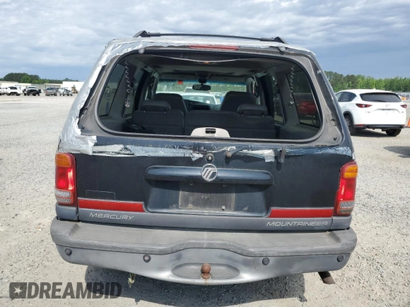 2001 Mercury Mountaineer z VIN 4M2ZU66E41UJ02651, wystawiony jako Copart lot #54207905 z przebiegiem 294 148 mil mil oraz Szkoda całkowita • Salvage title. Historia ofert i sprzedaży dostępna na DreamBid. Obrazek 6.