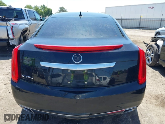 2013 Cadillac XTS Luxury z VIN 2G61R5S32D9226506, wystawiony jako IAAI lot #42208105 z przebiegiem 140 255 mil mil oraz . Historia ofert i sprzedaży dostępna na DreamBid. Obrazek 16.