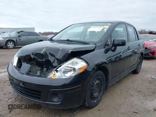 2011 Nissan Versa 1.8 S with VIN 3N1BC1AP7BL378133, listed as a IAAI auction lot 41917425 with 124,228 mi miles. Bid and sale history available at carsss.com. Image 2.