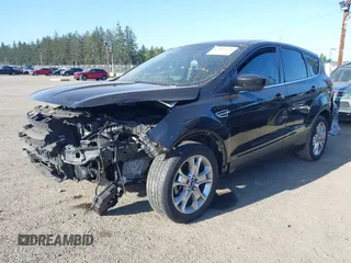 2014 Ford Escape SE with VIN 1FMCU9G9XEUB01861, listed as a IAAI auction lot 42096150 with 141,853 mi miles. Bid and sale history available at carsss.com. Image 2.