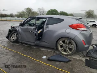 2015 Hyundai Veloster z VIN KMHTC6AD4FU241307, wystawiony jako Copart lot #53704525 z przebiegiem Nie podano mil oraz Szkoda całkowita • Salvage title. Historia ofert i sprzedaży dostępna na DreamBid. Obrazek 2.