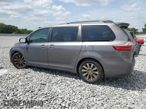 2015 Toyota Sienna XLE with VIN 5TDYK3DC5FS630556, listed as a Copart auction lot 54019705 with 183,421 mi miles and Salvage Title. Bid and sale history available at DreamBid. Image 2.