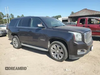 2015 GMC Yukon SLT with VIN 1GKS1BKC0FR239629, listed as a Copart auction lot 77414814 with 171,611 mi miles and Salvage Title. Bid and sale history available at carsss.com. Image 4.