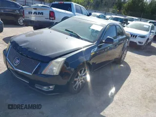 2009 Cadillac CTS RWD w/1SA with VIN 1G6DJ577890165194, listed as a IAAI auction lot 42024250 with 1 mi miles. Bid and sale history available at carsss.com. Image 1.