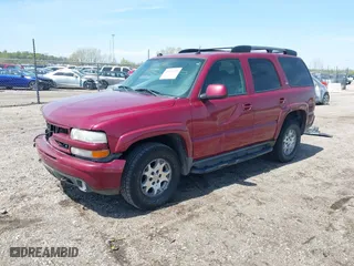 2005 Chevrolet Tahoe LT with VIN 1GNEK13T25R261555, listed as a IAAI auction lot 42060225 with 151,190 mi miles. Bid and sale history available at carsss.com. Image 2.