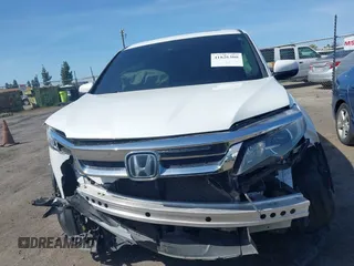 2020 Honda Pilot EX-L with VIN 5FNYF5H59LB027265, listed as a IAAI auction lot 41826300 with 57,201 mi miles. Bid and sale history available at carsss.com. Image 13.