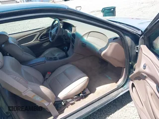 1995 Mercury Cougar z VIN 1MELM62W5SH606001, wystawiony jako IAAI lot #42461451 z przebiegiem 83 279 mil mil oraz . Historia ofert i sprzedaży dostępna na DreamBid. Obrazek 5.