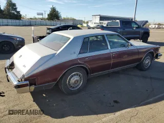 1984 Cadillac Seville z VIN 1G6AS6984EE826325, wystawiony jako Copart lot #77209864 z przebiegiem 26 366 mil mil oraz Tytuł czysty. Historia ofert i sprzedaży dostępna na DreamBid. Obrazek 3.
