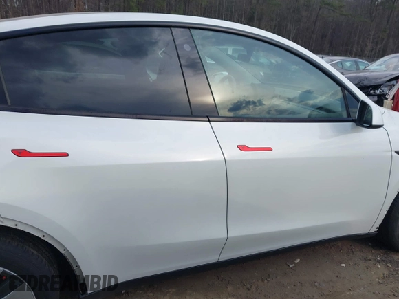 2023 Tesla Model Y Long Range with VIN 7SAYGDEE2PF765395, listed as a IAAI auction lot 41688080 with 27,792 mi miles and . Bid and sale history available at DreamBid. Image 13.