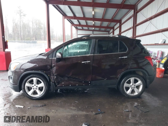 2015 Chevrolet Trax LTZ with VIN KL7CJTSB9FB147244, listed as a IAAI auction lot 41722081 with 125,675 mi miles. Bid and sale history available at carsss.com. Image 14.