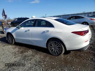 2021 Mercedes-Benz CLA with VIN W1K5J4HBXMN199220, listed as a Copart auction lot 86673214 with 29,801 mi miles and Salvage Title. Bid and sale history available at carsss.com. Image 2.