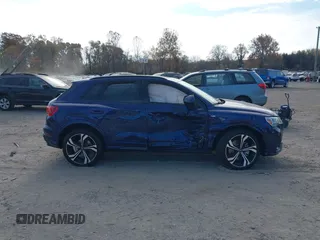 2024 Audi Q3 S line Premium Plus z VIN WA1EECF39R1107267, wystawiony jako IAAI lot #40791219 z przebiegiem 26 658 mil mil oraz . Historia ofert i sprzedaży dostępna na DreamBid. Obrazek 13.