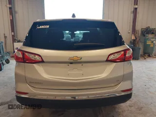 2019 Chevrolet Equinox LT z VIN 3GNAXJEV9KS633657, wystawiony jako IAAI lot #42379968 z przebiegiem 75 398 mil mil oraz . Historia ofert i sprzedaży dostępna na DreamBid. Obrazek 16.
