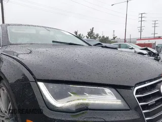 2014 Audi A7 3.0 Prestige with VIN WAU2GAFC5EN090233, listed as a IAAI auction lot 41565942 with 199,890 mi miles. Bid and sale history available at carsss.com. Image 20.