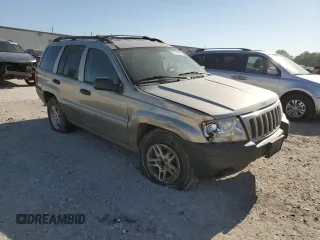 2004 Jeep Grand Cherokee Laredo with VIN 1J4GW48S34C307347, listed as a Copart auction lot 55749565 with Not provided miles and Salvage title. Bid and sale history available at DreamBid. Image 4.
