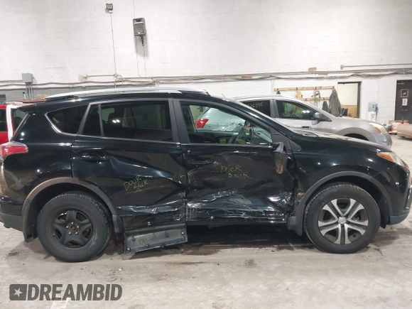2017 Toyota RAV4 LE with VIN 2T3BFREV8HW571887, listed as a IAAI auction lot 41612815 with 100,742 mi miles and . Bid and sale history available at DreamBid. Image 14.
