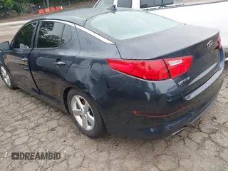 2015 Kia Optima LX with VIN 5XXGM4A70FG486256, listed as a IAAI auction lot 42211318 with 141,515 mi miles and . Bid and sale history available at DreamBid. Image 3.