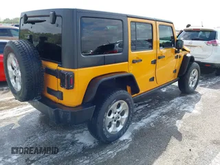 2013 Jeep Wrangler Unlimited Sport z VIN 1C4BJWDG6DL544197, wystawiony jako IAAI lot #41968556 z przebiegiem 121 101 mil mil oraz . Historia ofert i sprzedaży dostępna na DreamBid. Obrazek 4.