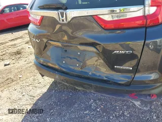 2018 Honda CR-V Touring with VIN 7FARW2H94JE044336, listed as a IAAI auction lot 41934128 with 70,861 mi miles. Bid and sale history available at carsss.com. Image 6.