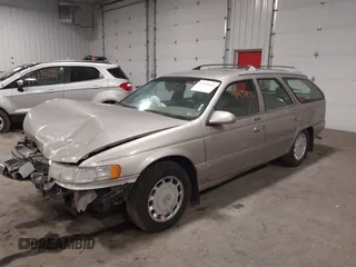 1994 Mercury Sable z VIN 1MELM5848RG607787, wystawiony jako IAAI lot #41938845 z przebiegiem 135 611 mil mil oraz . Historia ofert i sprzedaży dostępna na DreamBid. Obrazek 2.