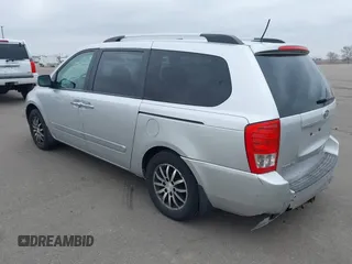 2012 Kia Sedona EX with VIN KNDMH4C78C6431441, listed as a IAAI auction lot 42013427 with 213,147 mi miles. Bid and sale history available at carsss.com. Image 3.