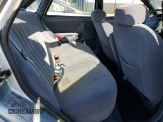 1993 Ford Taurus z VIN 1FACP5216PG197713, wystawiony jako Copart lot #80982424 z przebiegiem 79 330 mil mil oraz Szkoda całkowita • Salvage title. Historia ofert i sprzedaży dostępna na DreamBid. Obrazek 10.
