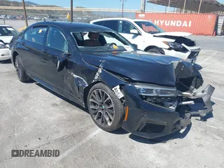 2020 BMW 7 Series 750i xDrive z VIN WBA7U2C02LGJ59766, wystawiony jako IAAI lot #42259594 z przebiegiem 27 540 mil mil oraz . Historia ofert i sprzedaży dostępna na DreamBid. Obrazek 1.