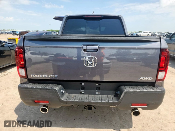 2023 Honda Ridgeline RTL z VIN 5FPYK3F5XPB025508, wystawiony jako Copart lot #64200695 z przebiegiem 3 913 mil mil oraz Szkoda całkowita • Salvage title. Historia ofert i sprzedaży dostępna na DreamBid. Obrazek 6.