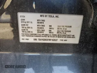 2024 Tesla Model Y with VIN 7SAYGDED7RF163537, listed as a Copart auction lot 48639255 with 7,193 mi miles and Salvage Title. Bid and sale history available at DreamBid. Image 14.
