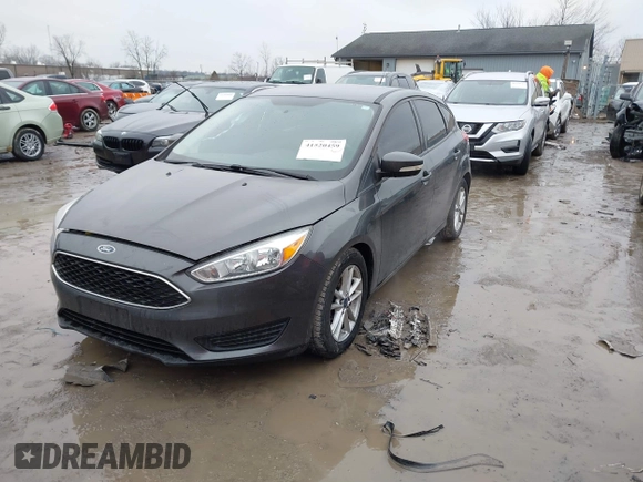 2015 Ford Focus SE with VIN 1FADP3K26FL383355, listed as a IAAI auction lot 41520459 with 142,111 mi miles and . Bid and sale history available at DreamBid. Image 17.