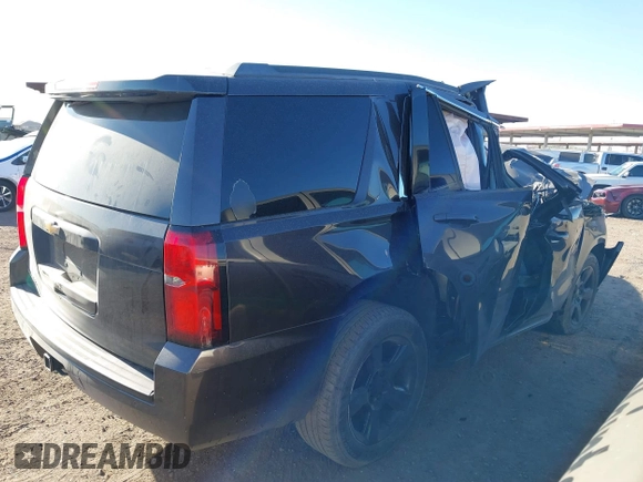 2015 Chevrolet Tahoe LT with VIN 1GNSCBKC0FR167957, listed as a IAAI auction lot 41526568 with Not provided miles and . Bid and sale history available at DreamBid. Image 4.
