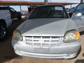 2003 Hyundai Accent GL with VIN KMHCG45C93U476176, listed as a IAAI auction lot 41940608 with 212,264 mi miles. Bid and sale history available at carsss.com. Image 6.
