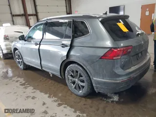 2023 Volkswagen Tiguan SE with VIN 3VVMB7AX5PM013447, listed as a IAAI auction lot 41615200 with 66,259 mi miles. Bid and sale history available at carsss.com. Image 3.