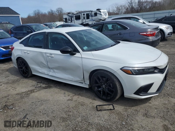 2022 Honda Civic Sport z VIN 2HGFE2F57NH550455, wystawiony jako Copart lot #52005235 z przebiegiem 31 396 mil mil oraz Szkoda całkowita • Salvage title. Historia ofert i sprzedaży dostępna na DreamBid. Obrazek 4.