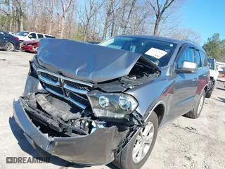 2012 Dodge Durango Crew with VIN 1C4RDHDG4CC130416, listed as a IAAI auction lot 41592420 with 174,372 mi miles. Bid and sale history available at carsss.com. Image 19.
