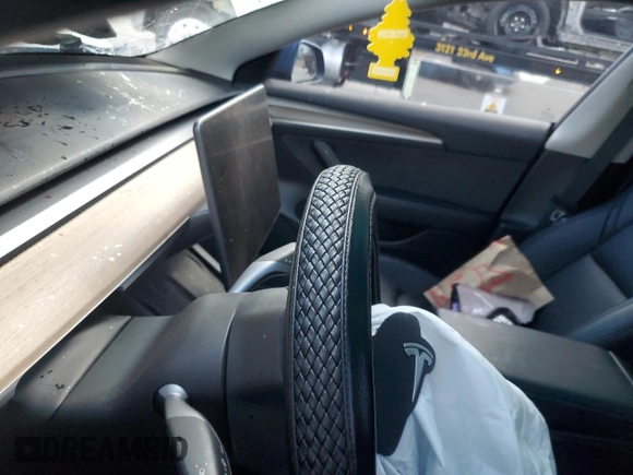 2023 Tesla Model 3 with VIN 5YJ3E1EA8PF626090, listed as a Copart auction lot 56892915 with Not provided miles and Salvage title. Bid and sale history available at DreamBid. Image 9.